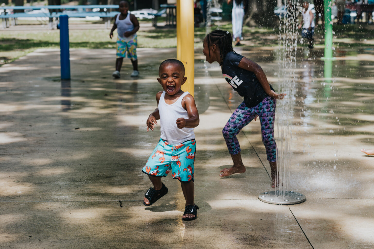 Children playing in splash pad.